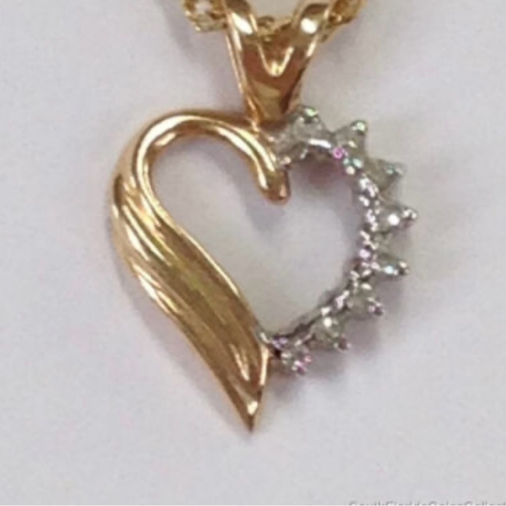 14k Gold necklace and pendant with genuine diamonds